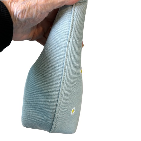 Skinny Dip of London light blue denim shoulder bag with daisies. - Picture 6 of 7